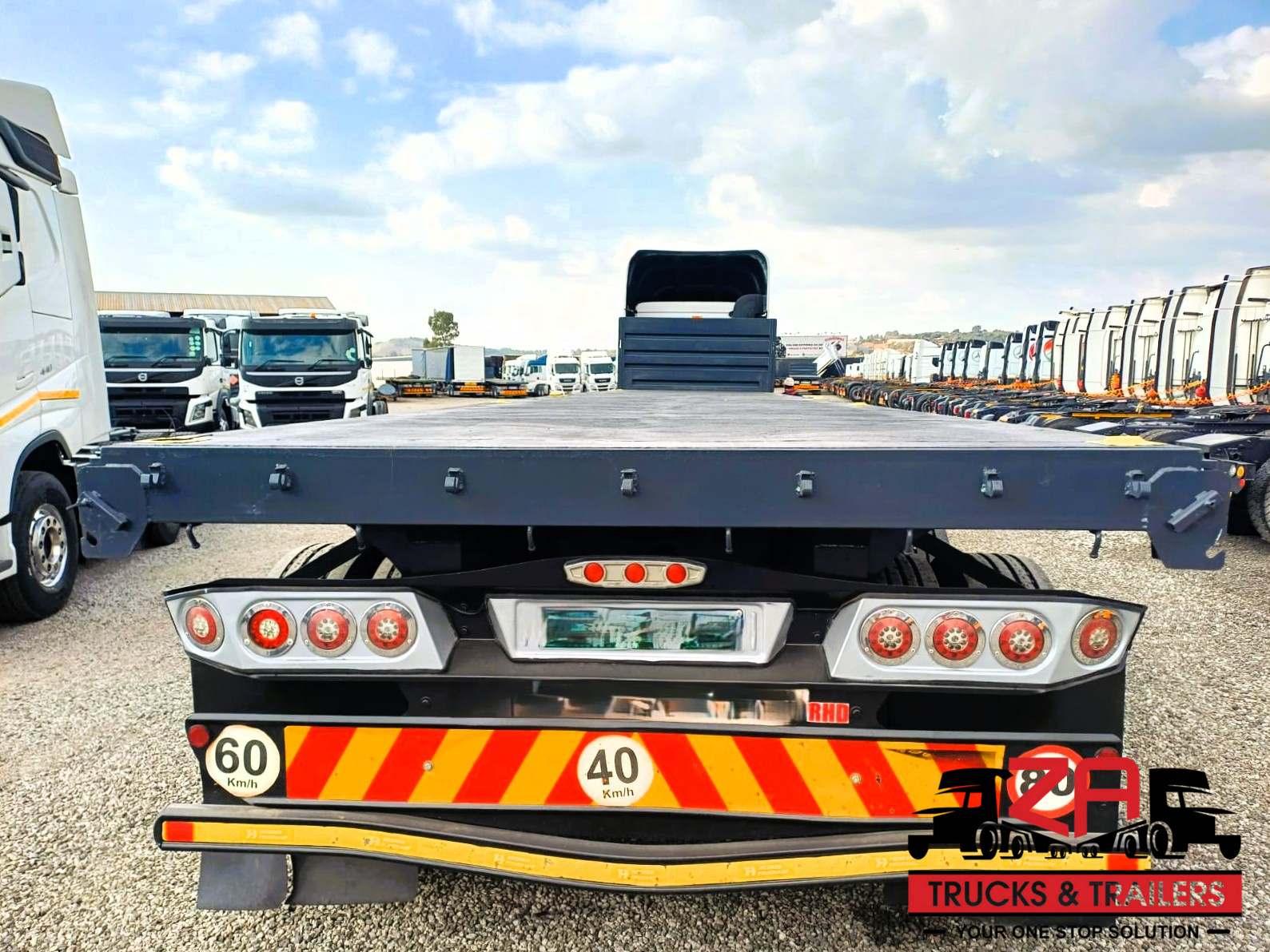2023 HENRED FRUEHAUF TRI-AXLE FLAT DECK TRAILER #53012